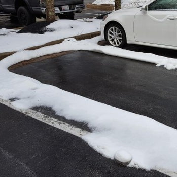Snow Melting & De-icing System Over Asphalt for Driveways and Garage Ramps
